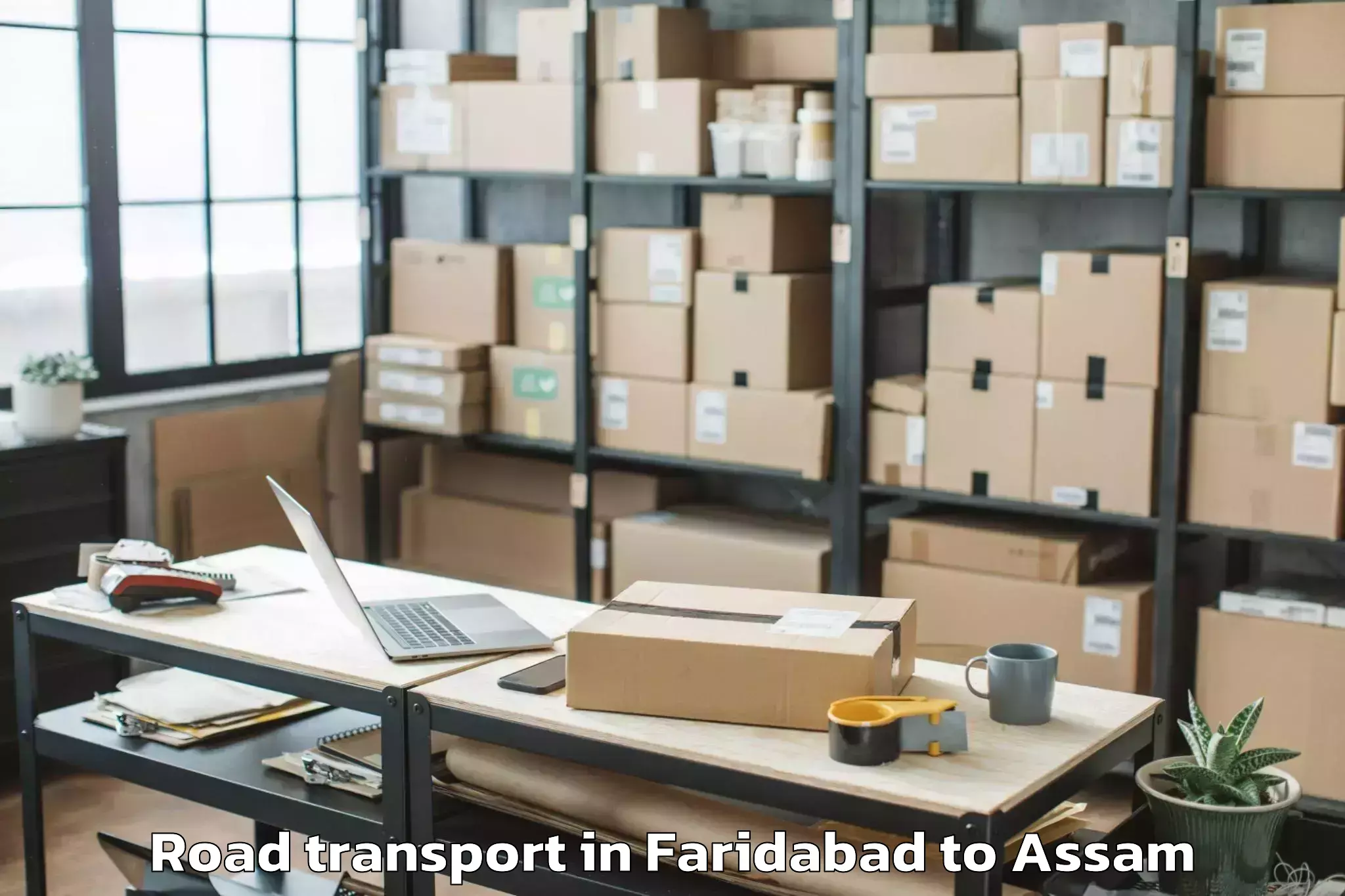 Expert Faridabad to Raha Gaon Road Transport